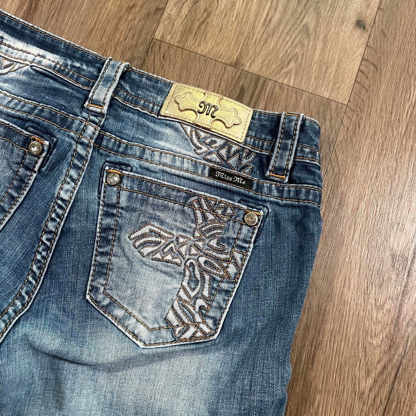 Miss Me Cross Detail Mid Rise Slim Boot Jeans