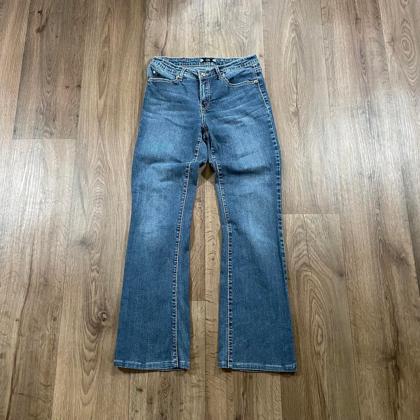 True Lux Flared Jeans Cross Detail