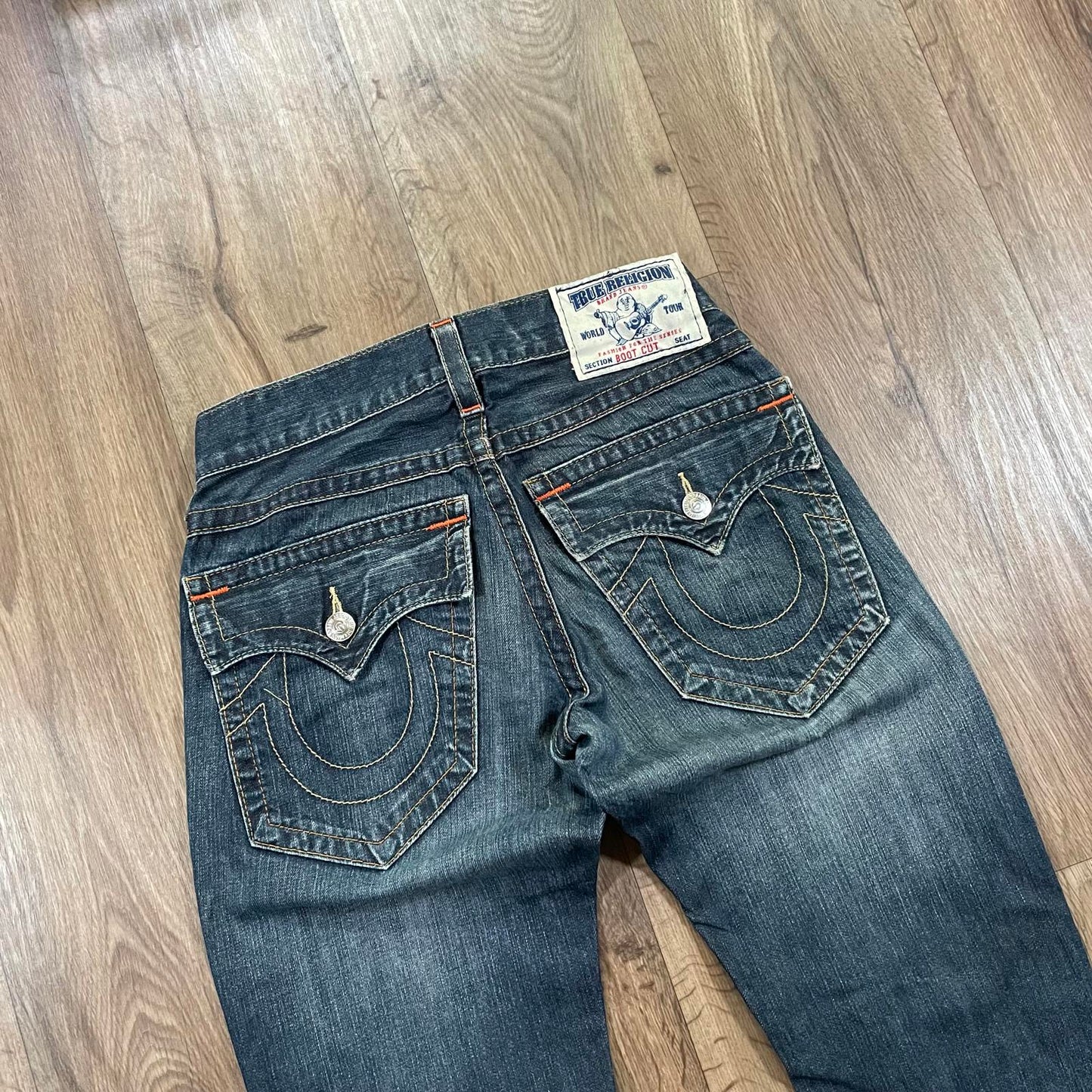 True Religion Boot Cut Jeans With Tan Stitching and Orange Accents W29 L30