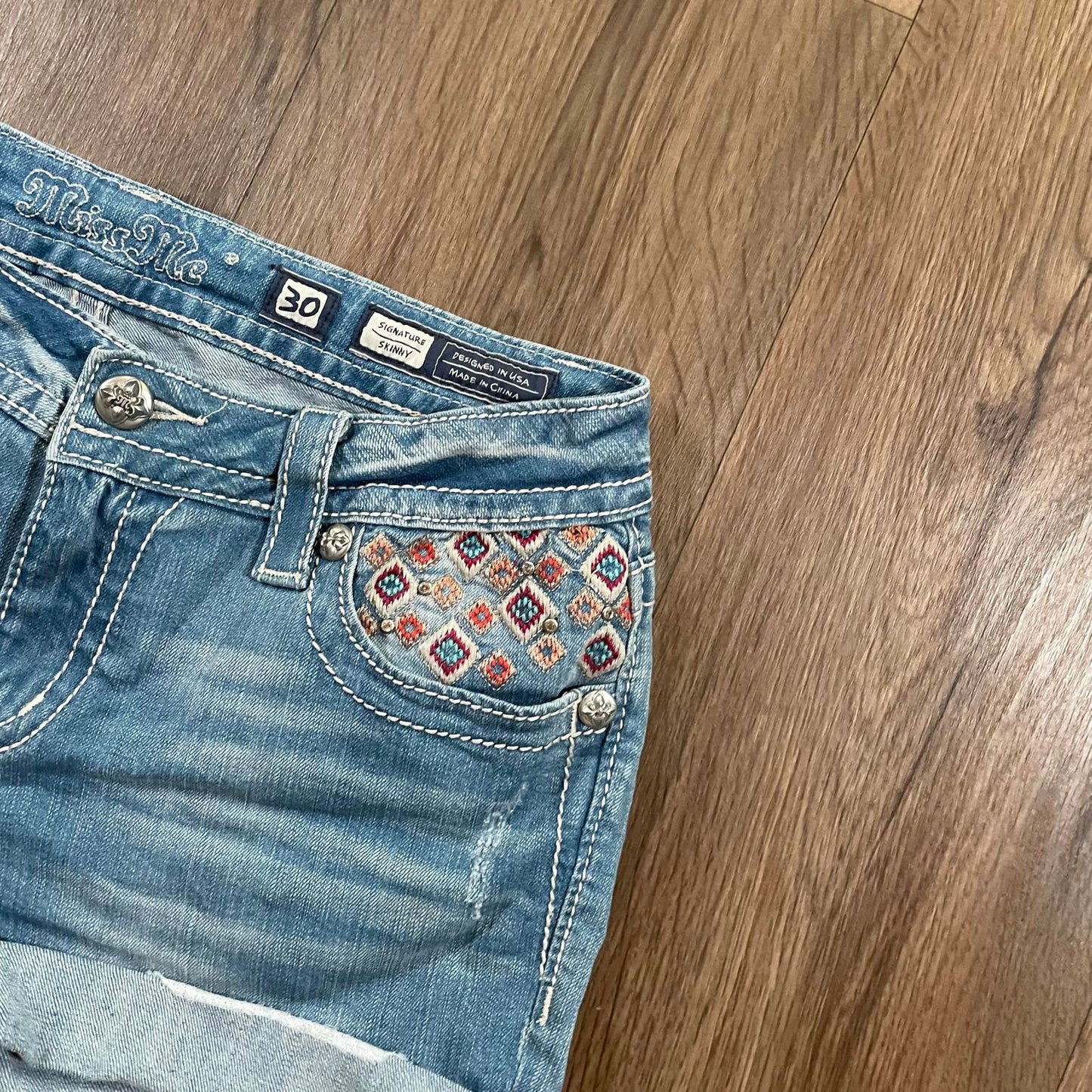 Miss Me Y2K Low Waisted Aztec Embroidered Mini Denim Shorts