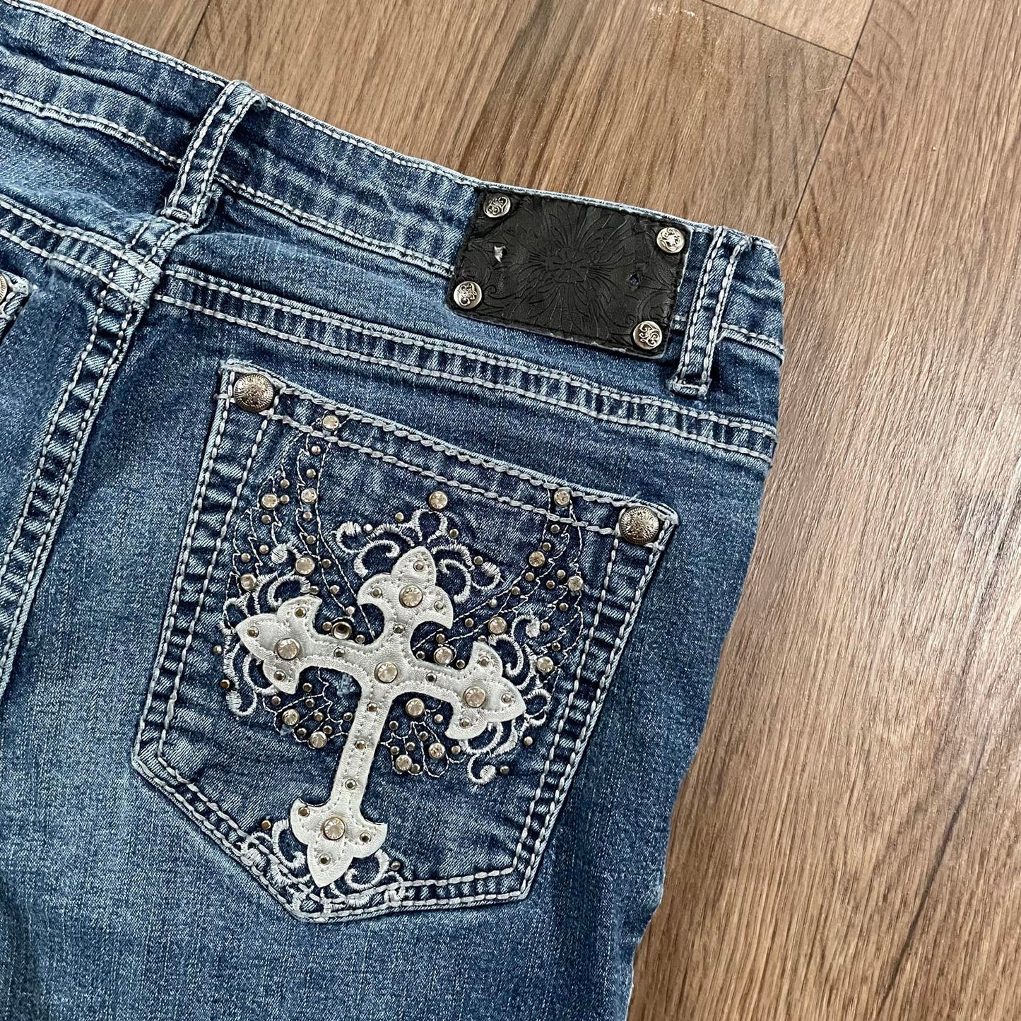 True Lux Flared Jeans Cross Detail